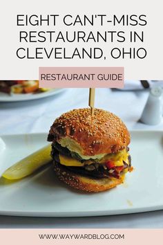 a hamburger on a plate with the title eight can't - miss restaurants in cleveland, ohio