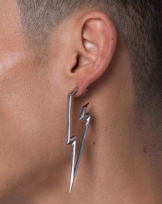 Powerfully electric. This thrilling statement earring will make you the brightest in the room. Each line of the lightning bolt is artfully extruded to perfection, surely to be your new favorite piece. Made of hypoallergenic stainless steel available in a silver or gold finish. Engineered with designer and skin safe sensibility. Ships in RARE-ROMANCE ™ branded packaging, perfect for gifts. Select your style | select your color | Add to cart | Ships same day of purchase PRODUCT SPECIFICATIONSLENTH Lightning Jewelry, Electric Blue Eyes, Lightning Earrings, Staple Earrings, Spike Hoop Earrings, Frankie Stein, Lightning Bolt Earrings, Silver Statement Earrings, Roller Girl