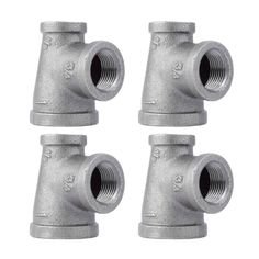 four pieces of metal pipe fittings