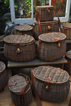 several wicker baskets stacked on top of each other