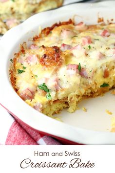 ham and swiss croissant bake on a white plate