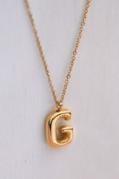 18K Gold Dipped Non-Tarnish Stainless Steel Initial Necklace. Approx. 18" long, no extender. The necklace is hypoallergenic, waterproof, fade-resistant, and tarnish-free, ensuring its beauty lasts for a long time. Looks great worn on its own or layered with our other stainless steel necklaces. Bubble Initial Necklace | Balloon Letter Necklace | Letter Charm Necklace | Initial Pendant Necklace | Name Necklace | Monogram Necklace | Real Gold Dipped Necklace | Real Gold Plated Necklace | Waterproof Sweatproof Jewelry, Water Hat, Necklace Name, Gold Necklace Simple, Letter Monogram, Jewelry Simple