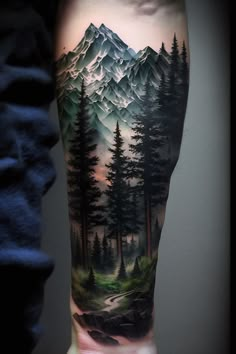 a man's arm with trees and mountains on it