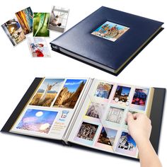 an open photo book with pictures inside and in the pages, being held by a person's hand