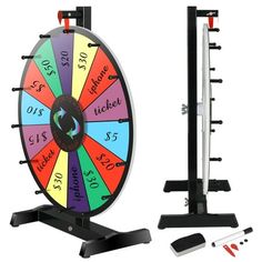 the wheel of fortune is on display in front of a white background with other items