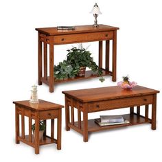 three wooden tables with plants in them on top of each table and one end table