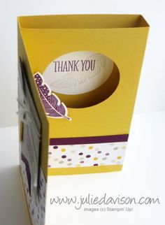 an open box with a thank you card inside