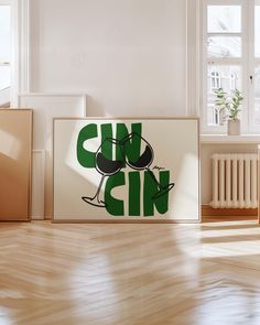 a poster with the words sun gin on it in front of a wooden floor and radiator