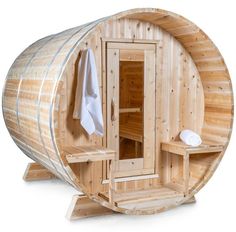 a wooden sauna is shown with the door open