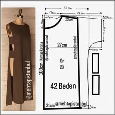 the size and measurements of a dress on a mannequin stand with measurements for it