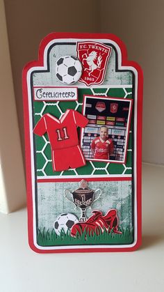 a card with soccer themed items on it