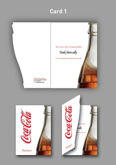 the coca - cola company business card and envelope design is designed to look like an old coke bottle