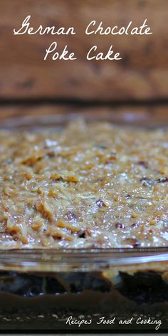 a close up of a pie in a glass dish on a table with the words german chocolate poke cake