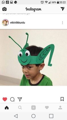 a little boy wearing a green bug mask on top of his head with the caption instagram