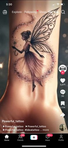 a tattoo on the foot of a woman with a flower and fairy wings painted on it