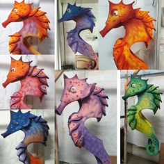 four pictures of seahorses hanging from hooks on the side of a wall in different colors