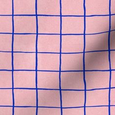 a pink and blue checkered fabric with lines on it