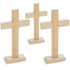 three wooden crosses sitting on top of each other