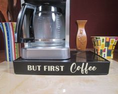 a coffee maker sitting on top of a counter