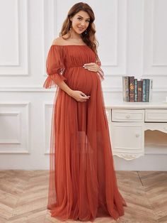 This elegant maternity dress features a square neckline and billowy long sleeves, along with a double skirt for a contemporary look that is suitable for a wedding, a bridesmaid dress, a formal event, and so much more. Fit: Please refer to Size Chart. Closure: It is Concealed a Zipper Up The Back. Undergarments: It is Not Padded, with Lining. Fabric: Shell:100%Polyester Lining:100%Polyester Stretch: Fabric is No Stretch. Flowy Maternity Dress, Elegant Maternity Dresses, Maxi Maternity Dress, Dresses For Photoshoot, Maternity Evening, Maternity Evening Dress, Maternity Dresses For Photoshoot, Burnt Orange Dress, Maternity Gown