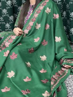 Green multicoloured kashmiri pashmina shawl is a statement piece with your winter outfits. Pure wool shawl. Embroidered kashmiri pashmina shawl. Beautiful winter accessory to pair with your statement dresses. Soft and warm beautiful winter shawl. Buy this for your self or give it to the ones you love ❤️  Length: 93 inches Width: 44.5 inches This item is dry clean only. Delivery 1-3 working days to UK 3-5 working days to Europe  And 6-7 working days to US and Other countries. Unstitched Pashmina Salwar Kameez For Eid, Eid Pashmina Salwar Kameez, Festive Jamawar Embroidered Fabric With Dabka, Bohemian Green Pashmina Shawl In Traditional Drape, Traditional Embroidered Green Shawl, Green Shawl With Resham Embroidery In Traditional Drape, Green Embroidered Shawl Dupatta, Embroidered Green Shawl Dupatta, Green Pashmina Shawl For Wedding