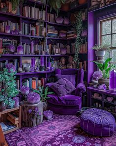 a living room with purple furniture and bookshelves filled with lots of books on shelves