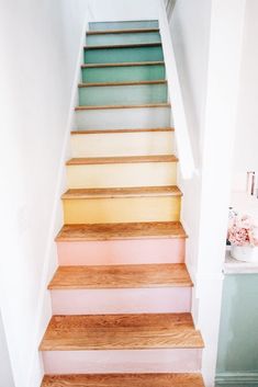 there is a set of stairs painted in different colors