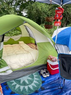 a tent is set up in the grass