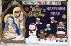 a nativity scene painted on the side of a building with snowmen and christmas decorations