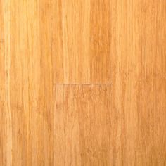 a close up view of a wooden surface with some grainy woodgrains on it