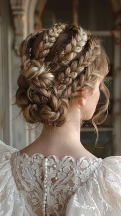 Feel like royalty with these regal braided updo hairstyles. Perfect for a majestic look. Save this pin for regal updo ideas! #Braids #Updo #RegalStyles Pirate Updo Hairstyles, Late 19th Century Hairstyles, Renicansse Fair Hairstyles, Complicated Braided Hairstyles, Fluttershy Moodboard, Fairy Updo, Fantasy Updo, Regal Hairstyles, Regal Updo