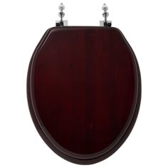 a wooden toilet seat with two brass handles