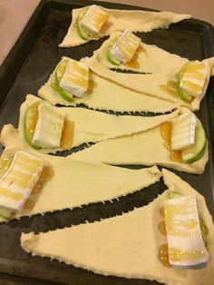 several pieces of food are arranged on a baking sheet to look like they have been cut into triangles