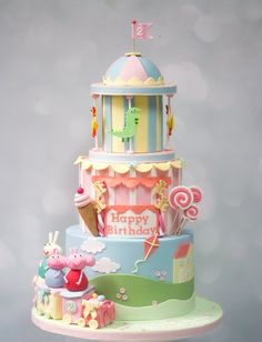 a three tiered birthday cake with pep the pig on it's top and an ice cream cone in the middle