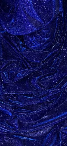 the blue fabric is very shiny and it looks like something out of space