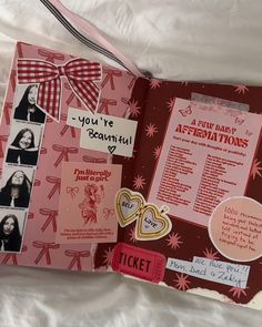 an open book with pictures and stickers on it