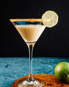 a margarita cocktail garnished with a lime slice