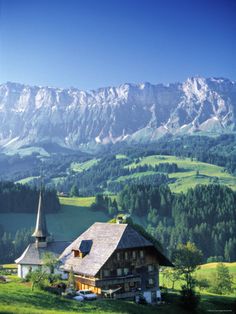 a church in the middle of a mountain range