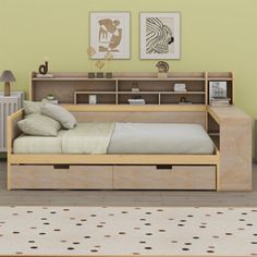 a bed with drawers underneath it in a room