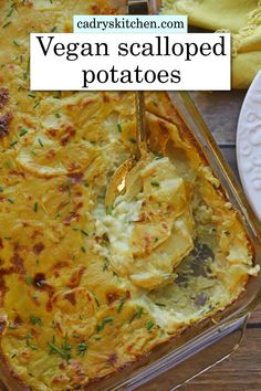 a casserole dish is shown with a spoon in it and the title says vegan scalloped potatoes