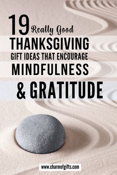 a rock sitting on top of sand with the words 19 really good thanksgiving gift ideas that encourages mindfulness and gratitude