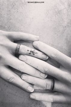 Wedding Ring Tattoos: A Timeless Symbol of Everlasting Love. Explore unique designs and meaningful expressions of commitment. Find inspiration for your own ring tattoo here. #weddingringtattoos #lovesymbol #ringtattoos Wedding Ring Tattoos, Traditional Rings, Ring Finger Tattoos