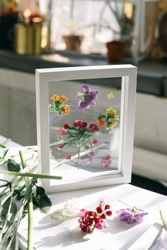 some flowers that are sitting on a table