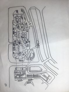 a drawing of an airport with the ground plan marked in black and white, as well as some buildings