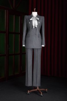 Elevate your look with this grey pinstripe suit, perfect for anyone who values impeccable tailoring and timeless style. Whether it's a business meeting or a social event, this suit promises a sophisticated and confident appearance for the modern professional. Striped Tuxedo Suit For Business, Pinstripe Double Breasted Suit For Business Casual, Pinstripe Double Breasted Business Casual Suit, Elegant Gray Double Breasted Suit For Semi-formal Occasions, Pinstriped Suit, Gray Tailored Tuxedo For Work, Elegant Gray Double Breasted Suit With Suit Collar, Pinstripe Suit With Suit Collar For Office Wear, Gray Double Breasted Suit For Office