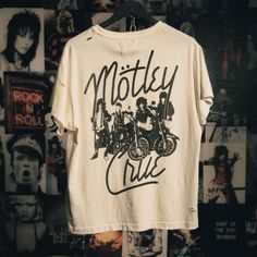 OTHER X MOTLEY CRUE We've teamed up with the bad boys of Rock N Roll, Motley Crue to delve deep into the archives to bring you a collection of painstakingly recreated vintage tees & tanks.   Every tee has been individually treated to create a unique and original product. All hand washed, printed, distressed, aged, beaten, blasted and burned at our UK studio using our signature blend of authentic vintage plastisol inks.  Please Note: Due to the extensive washing process we've developed for our vi Rock And Roll Tshirt, Mens Vintage Graphic Tees, Tour Shirt Design, Rock Band T Shirts, Band Tshirt Aesthetic, Band Merch Design, Band Tee Aesthetic, Merch Design, Vintage Graphic Tees