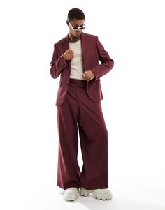 Suit pants by ASOS DESIGN You choose the occasion Stripe design Regular rise Belt loops Functional pockets Wide leg