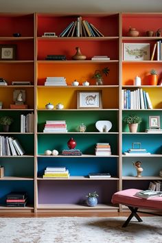 a living room filled with lots of colorful bookshelves