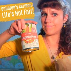 a woman holding a can of vegetables in front of her face with the caption children's salmon life's not fair