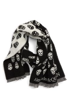 Signature skulls menacingly smile across this cozy wool scarf finished with fluttery bits of fringe at the edges. 66" x 13 1/2"; 1" fringe 100% wool Dry clean Made in Italy Alexander Mcqueen 90s, Black And White Alexander Mcqueen, Alexander Mcqueen Skull Scarf, Scarf Aesthetic, Mcqueen Scarf, Alexander Mcqueen Skull, Skull Scarf, Scarf Outfit, Reversible Scarf